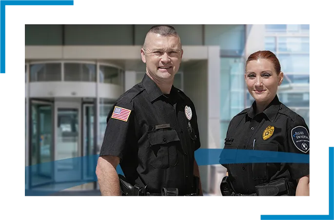Two law enforcement officers standing in uniform