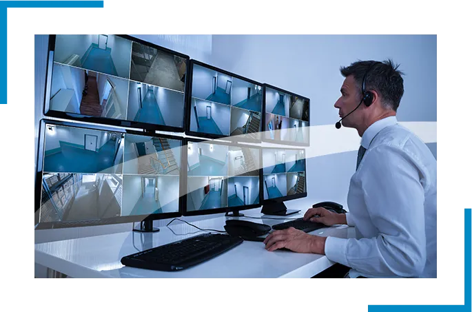 Security professional looking at the monitors